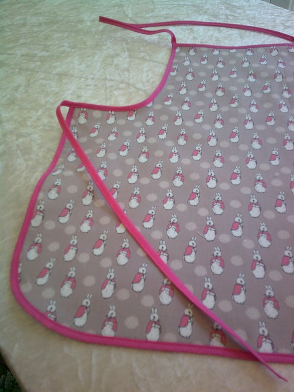 Bunnies in Pink Capes Baby Apron