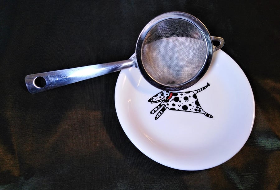 Shallow drip dish, decorated with a friendly Dalmatian with a red collar.
