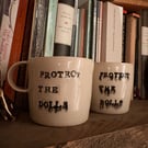 Protect the Dolls mugs