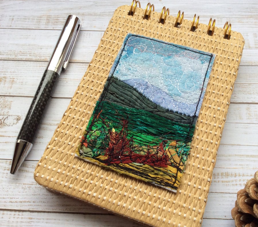 Embroidered landscape A6 raffia reporters notepad. 