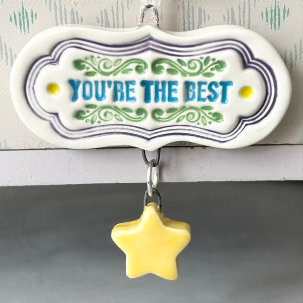 Small Ceramic dangly decoration with star