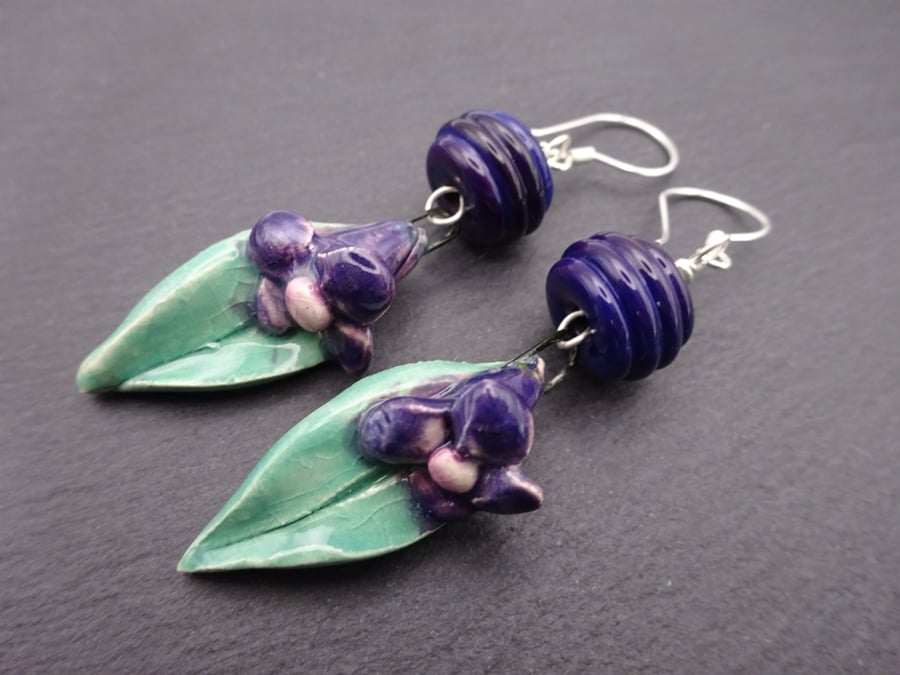 lampwork glass and ceramic purple flower earrings