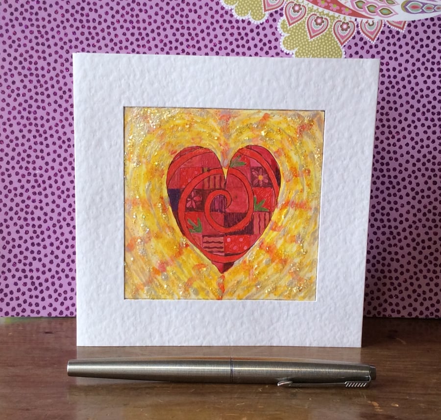Handmade patterned red heart card. 
