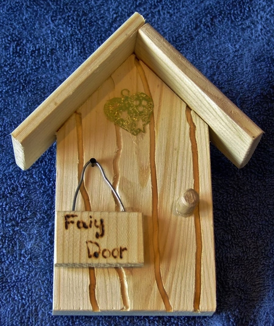 Handcrafted magical fairy or hobbit door for home or garden decoration ornament