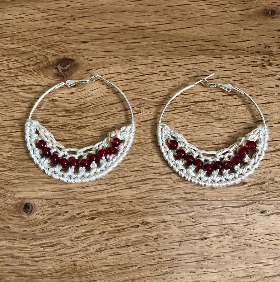 Hello January....Silver plated earrings with crochet and garnet design.