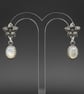 Cream mother of pearl and antique silver flower earrings - Image 2