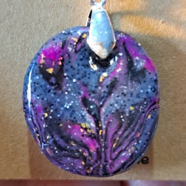 Vibrant purple, black, silver, gold and glitter pendant