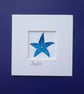A blue batik 'Starfish' fabric picture - 4x4 inches including mount