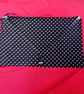 Clutch bag in black and white polka dots - Image 2