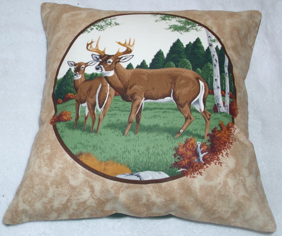 Deer and Stag in a field by an Autumnal forest cushion