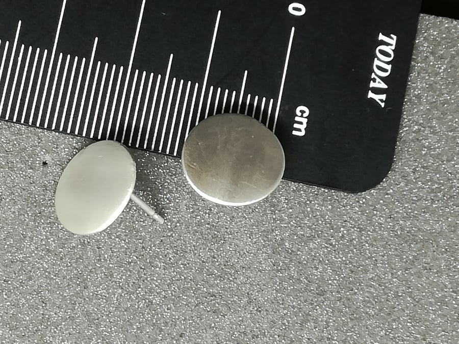 Round Silver Satin finish circle studs.