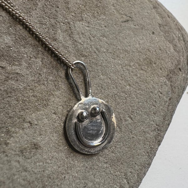 Small smiley pendant - sterling silver on a silver chain