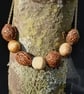 Nectarine Kernels and Bay tree bead necklace.