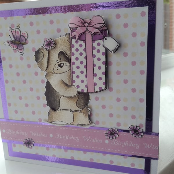 Cute doggie with present birthday card