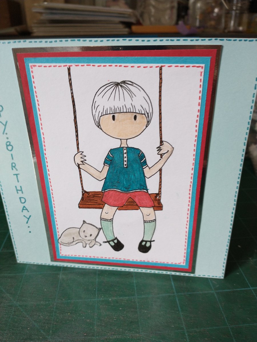 Cute boy on swing birthday card