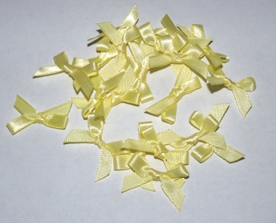 Small Yellow Bows for Card making  REDUCED TO CLEAR.