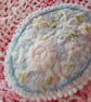 Oval, textile brooch with pastel, embroidered flowers. - Image 9