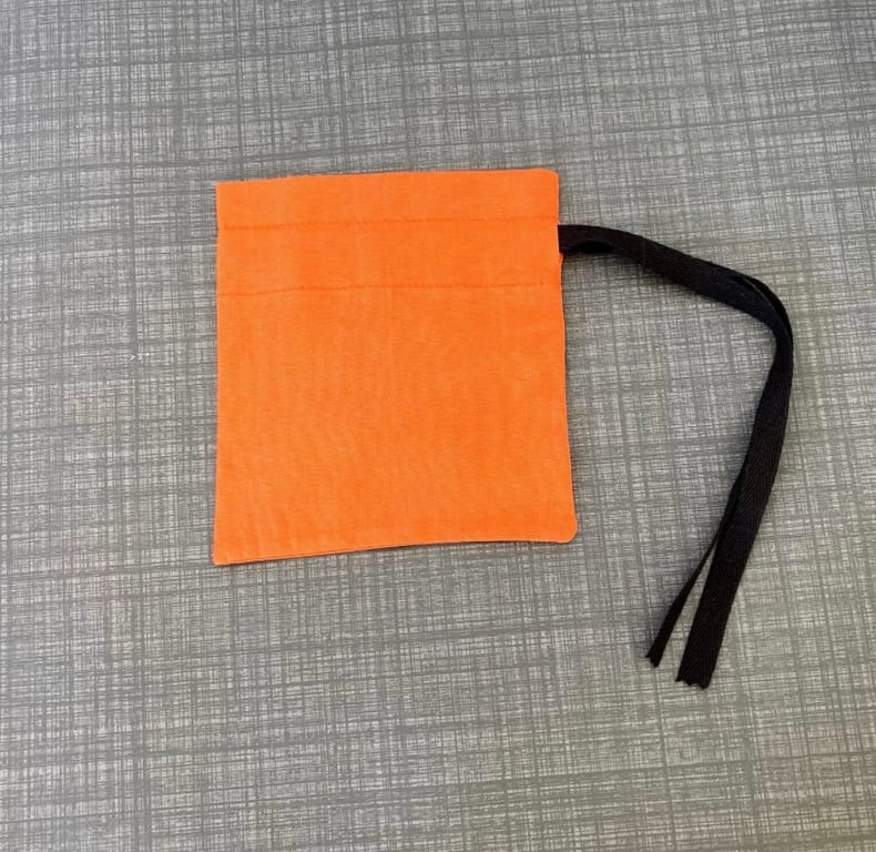 Orange Cotton Fabric Drawstring Gift Bag: Reusable XS Present Wrap.