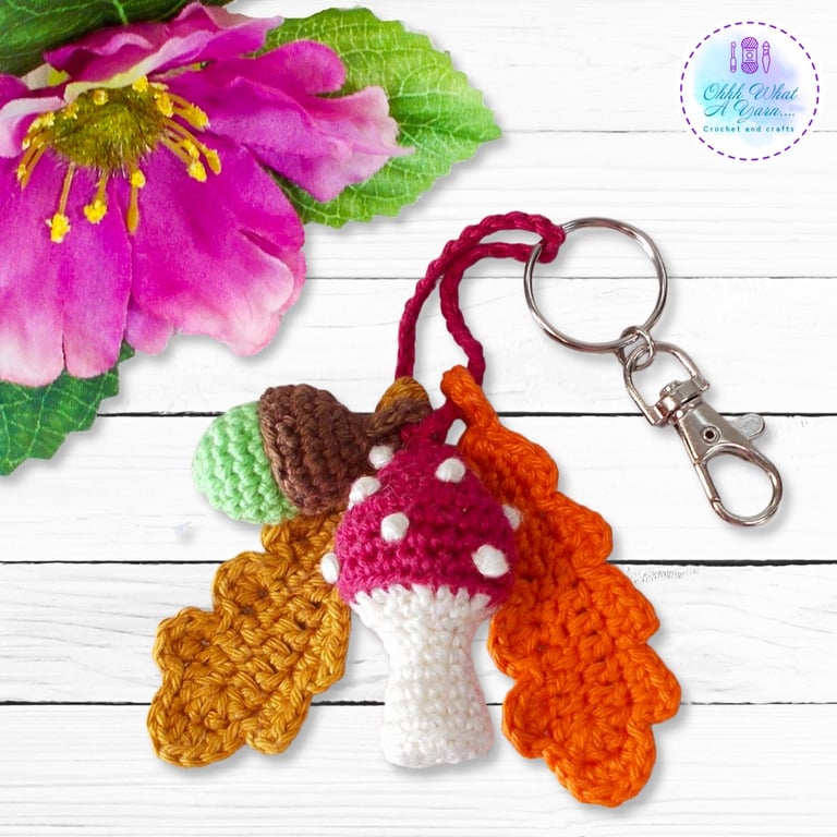 Red toadstool, acorn and oak leaves crochet bag charm. Toadstool keyring