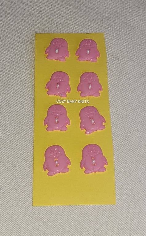 PINK PENGUIN SHAPED BUTTONS WITH TWO HOLES FOR ATTACHING 