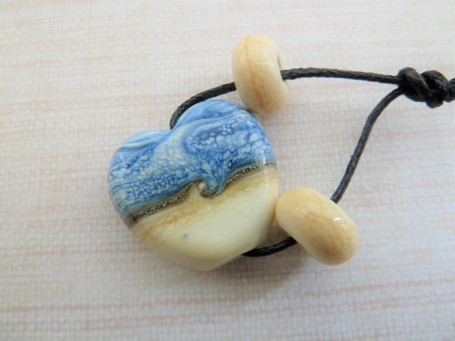 blue sea lampwork glass heart bead