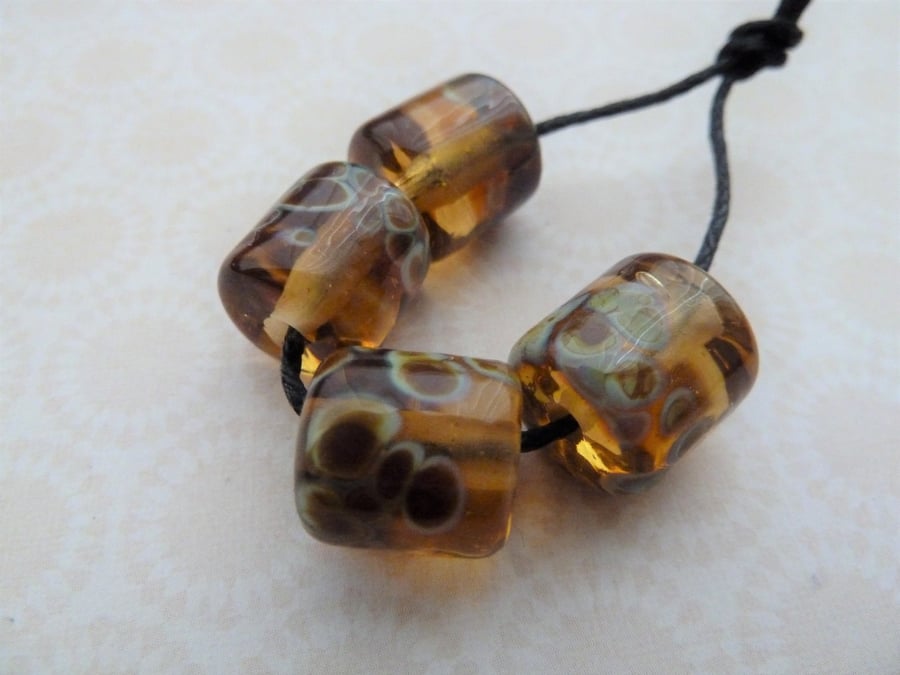 handmade lampwork glass beads, amber barrels