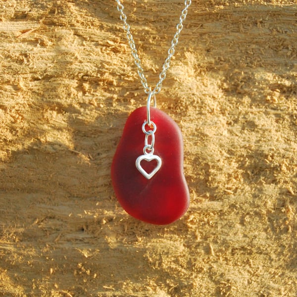 Red beach glass pendant with silver heart