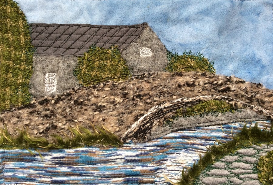 Embroidered landscape of Yorkshire bridge, mill and canal. 