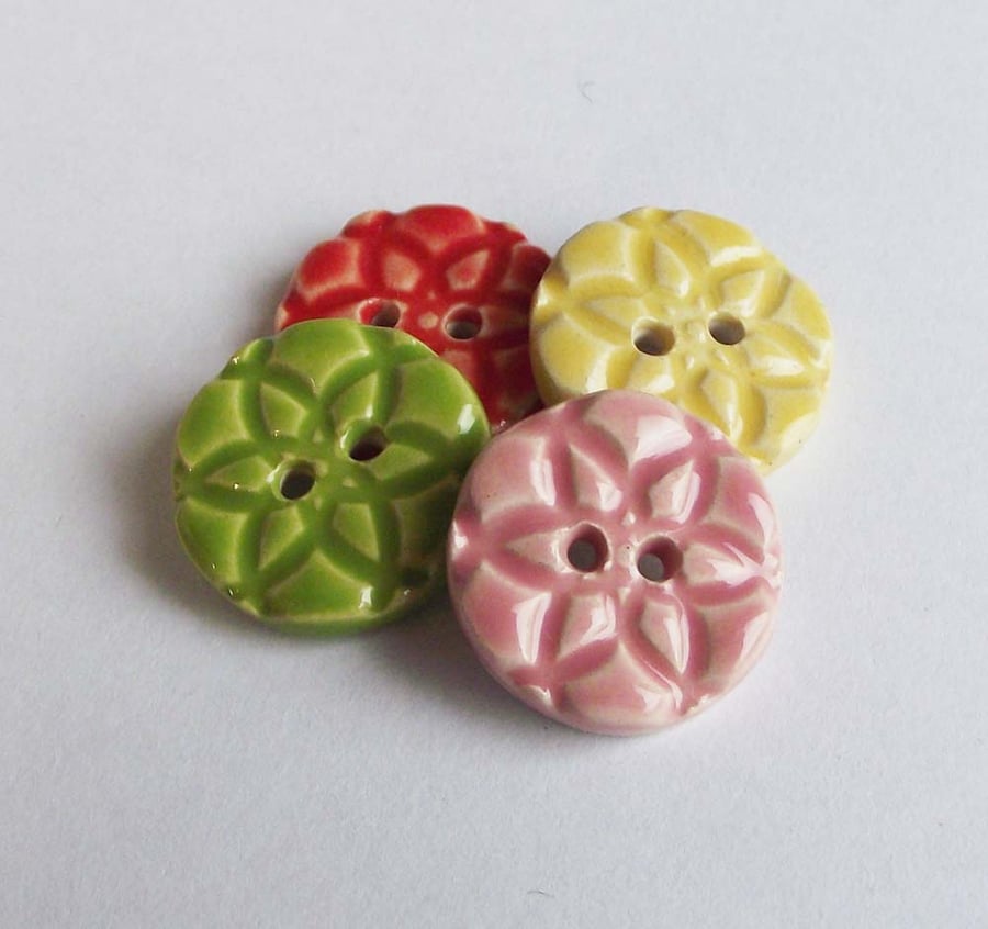 Set of four little handmade ceramic buttons