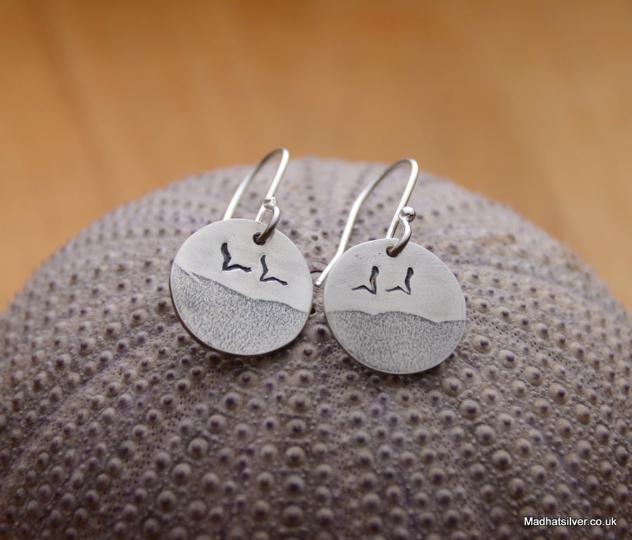 Silver beach themed earrings with seagulls