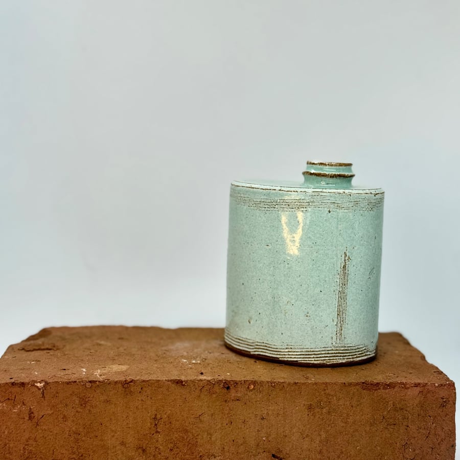 Hand built blue-green bud vase. No 3