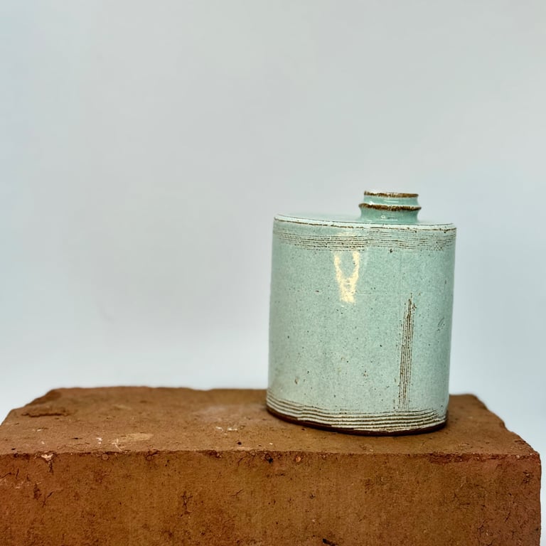 Hand built blue-green bud vase. No 3