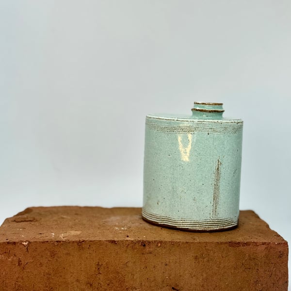 Hand built blue-green bud vase. No 3