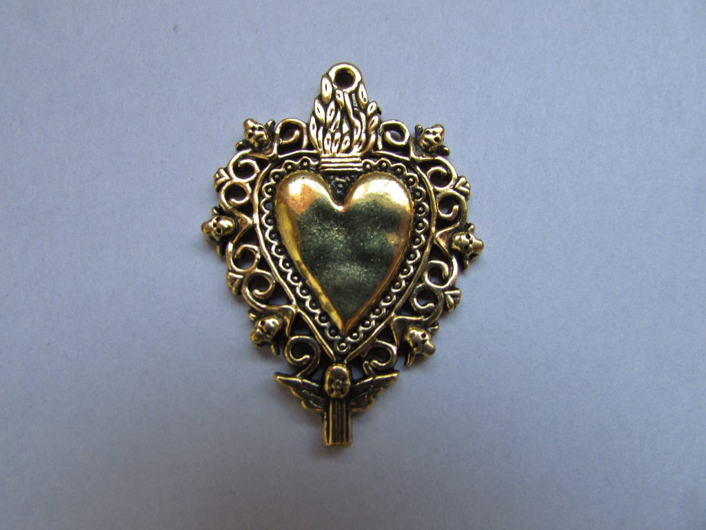 Gold Burning Heart Tibetan Jewellery Charm