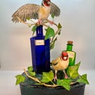 Papier maché goldfinch sculpture 