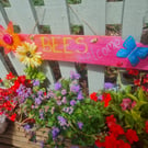 Handmade, upcycled wooden "bees welcome" sign