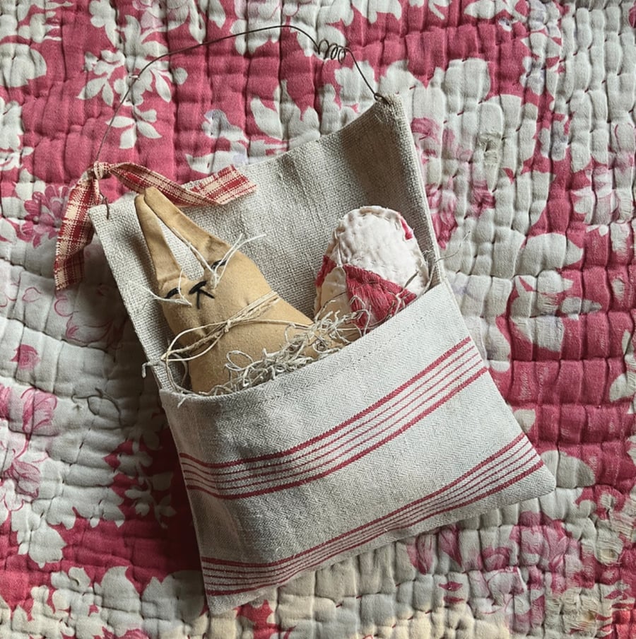 Primitive Bunny in vintage linen pocket