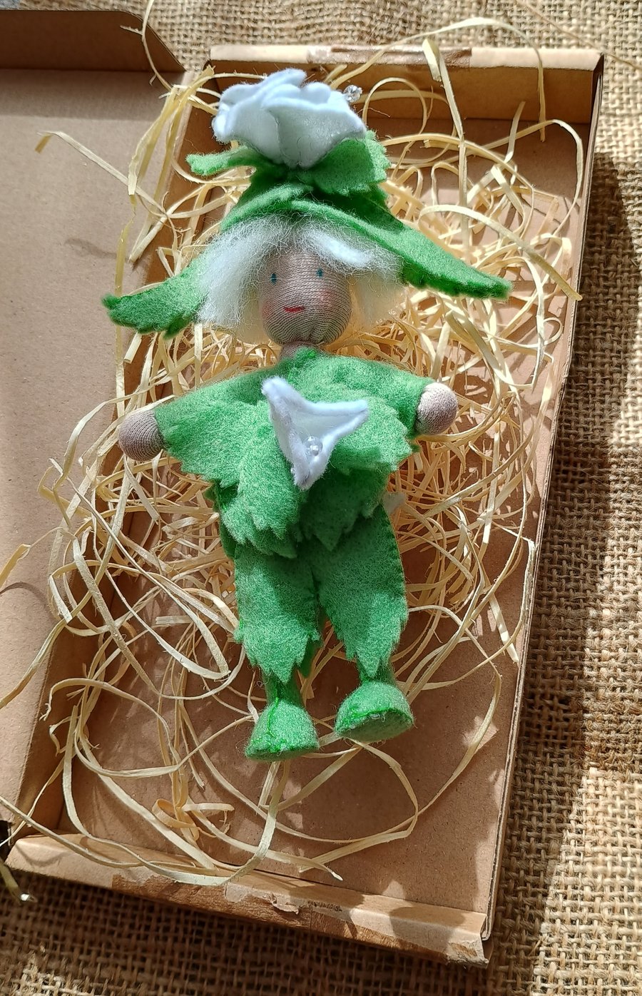 Felted white flower leaf hanging doll