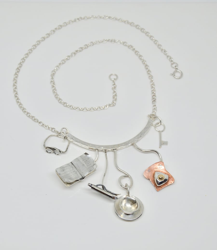 Sterling silver breakfast choker pendant.