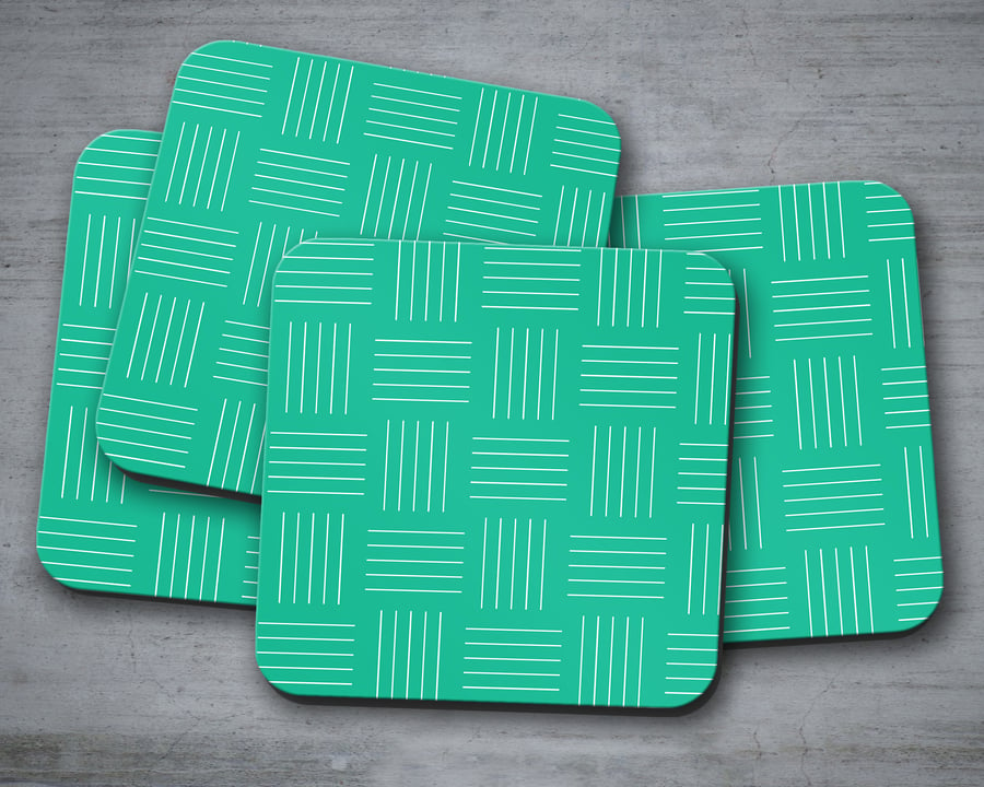 Set of 4 Coasters in Green with White Geometric Design