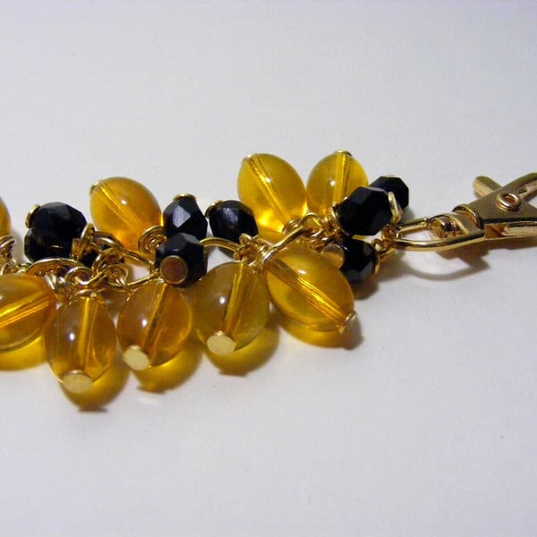 Black and Amber Colour Bag Charm