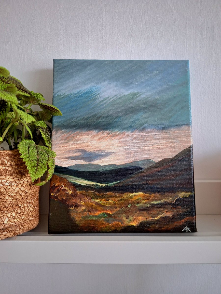 Look towards the light - sunlight on distant fells. 