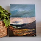 Look towards the light - sunlight on distant fells. 