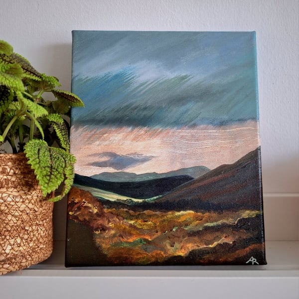 Look towards the light - sunlight on distant fells. 