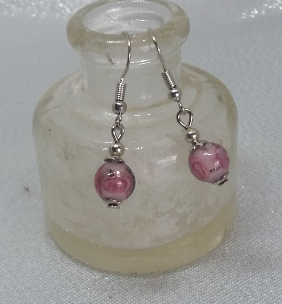 ER88 Pink glass bead with inner flower drops