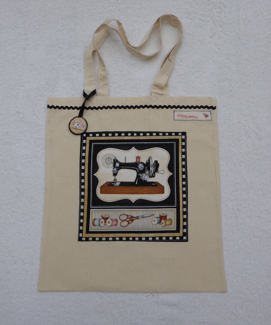 Cotton Canvas Bag with Sewing Machine Applique Panel and Bag Charm. Black.