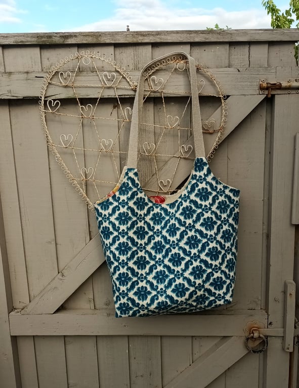 Two bags in one.  Lined tote bag