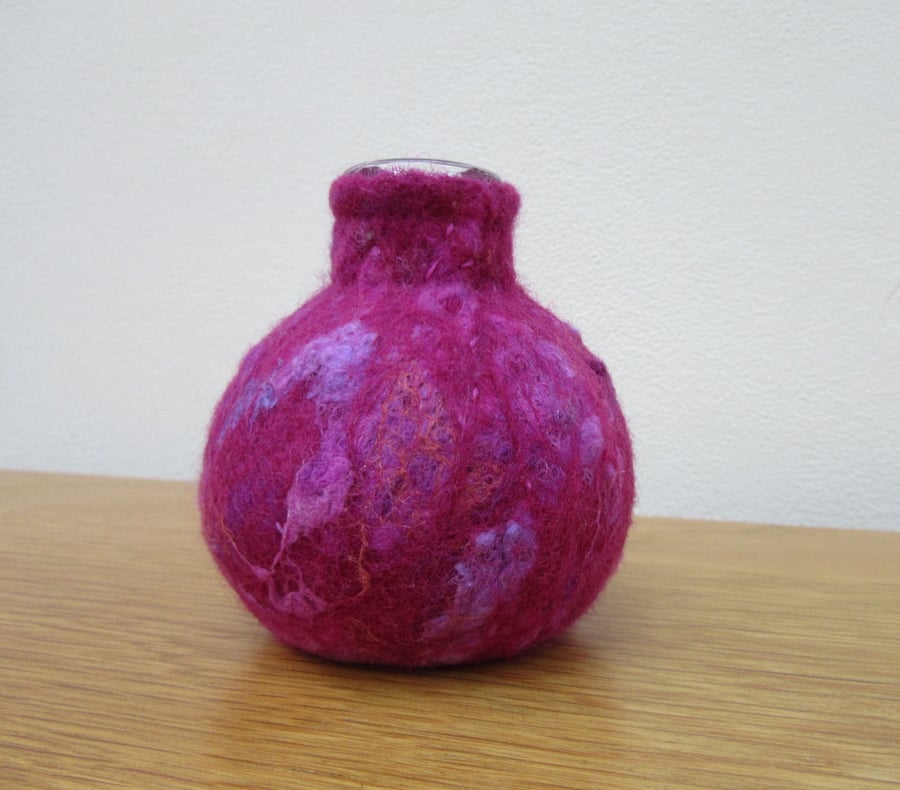 Small pink vase.  Glass vase wrapped in hand made dark pink magenta felt cover 