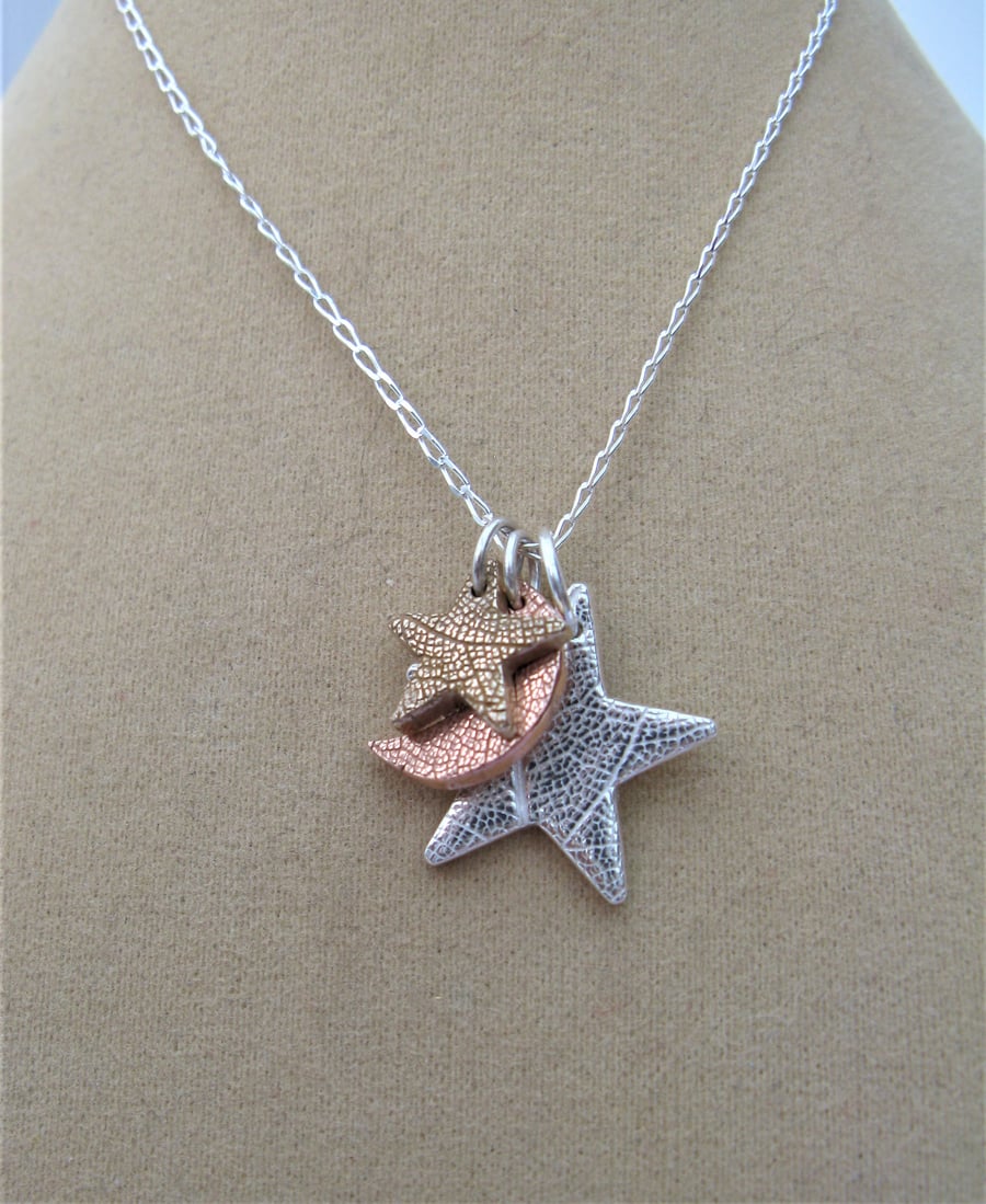 Moon and stars necklace in silver, copper and bronze