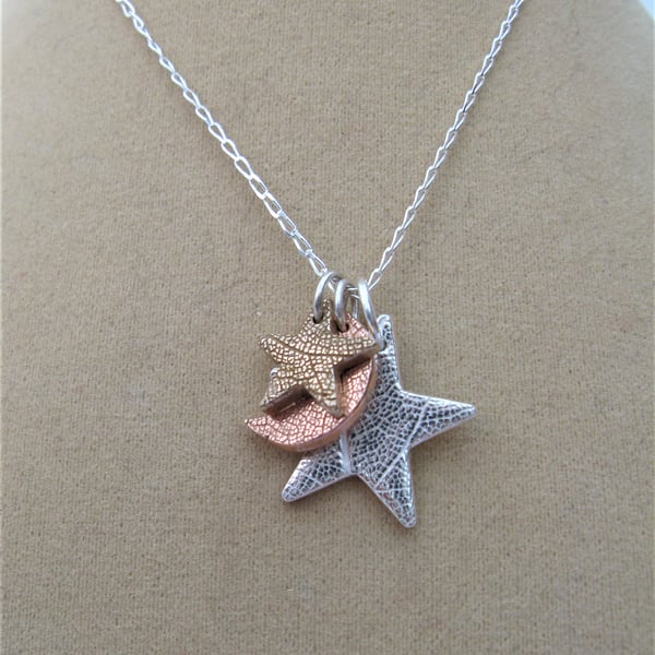 Moon and stars necklace in silver, copper and bronze